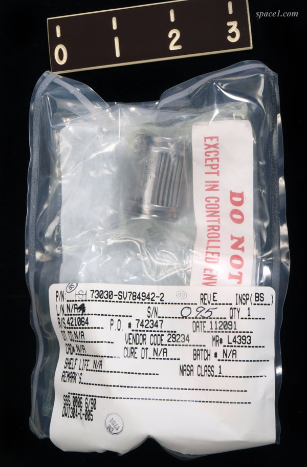 UCD_STS-74_package_back_600